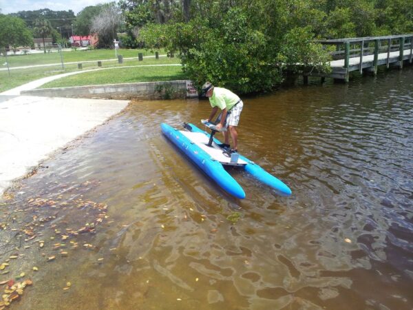 A person on a blue modular pontoon boat