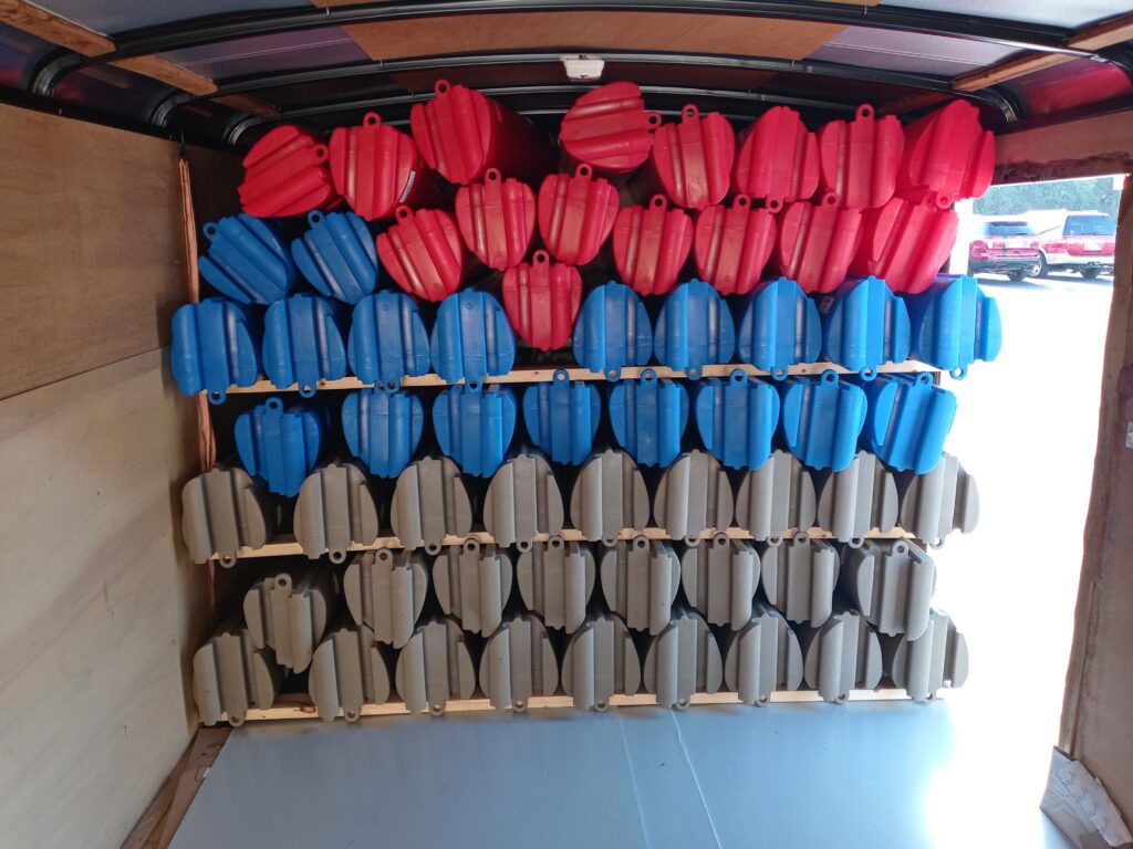 Stacked blue modular kayaks